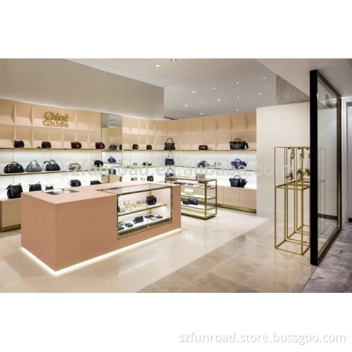 Department store ladies handbag displays metal display shelves and wood display cases
